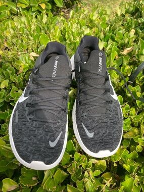 Nike Black and White Nike Free Athletic Running Shoe